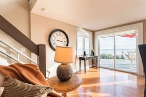 This peaceful corner with lake views and warm decor is the perfect spot to relax with a book or a cup of tea.