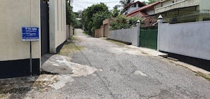 The entry lane from Muththettugoda road leading to the property.