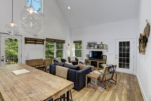 Living room extends from kitchen in open floor plan