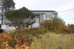  "Seaside elegance, spacious deck, ocean air—your dream getaway awaits!