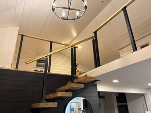 loft view above modern floating stairs