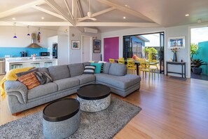 Roomy living space, light and lovely with comfy couch and a gorgeous view.