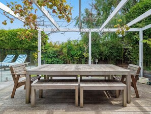 Dine under the shade of our pergola; perfect for that summer barbeque