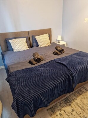 Two single beds joined together to make a king size bed