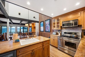 Kitchen: Keurig, toaster, cooking utensils, tableware, main floor