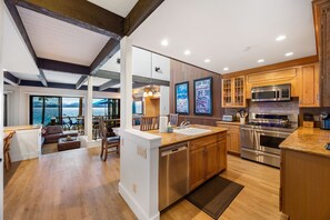 Kitchen: Keurig, toaster, cooking utensils, tableware, main floor