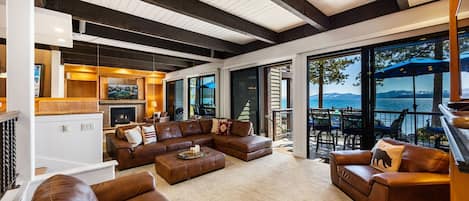 Living room: Main floor, gas fireplace, Smart TV, deck access, radiant heating, no A/C, main floor