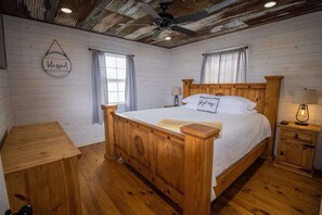 A sanctuary of quietude, where restful nights await. The warm hues and rustic charm invite serenity.