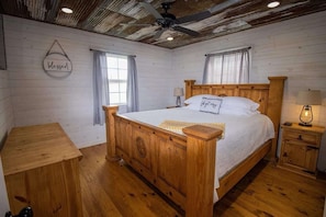 A sanctuary of quietude, where restful nights await. The warm hues and rustic charm invite serenity.