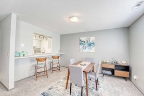 You'll love this inviting space—perfect for dining, casual chats, and playing board games with friends and family.