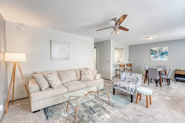 Spacious open-concept living and dining area, perfect for gathering and relaxation.