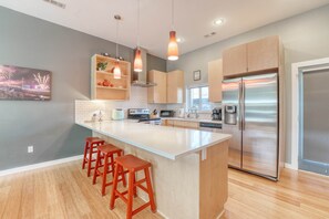 Versatile and stylish! This kitchen island doubles as an extended dining area—perfect for snacks and a quick breakfast!