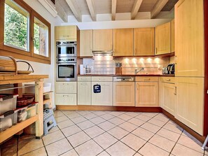 Kitchen, Kitchen Appliance, Countertop, Major Appliance, Cabinetry, Wood, Interior Design, Flooring, Furniture, Cupboard