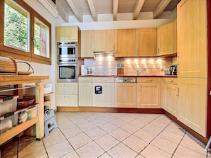 Kitchen, Kitchen Appliance, Countertop, Major Appliance, Cabinetry, Wood, Interior Design, Flooring, Furniture, Cupboard