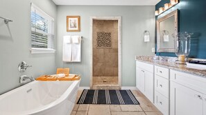 [Upstairs, Master] Soak the day away in this luxe bathtub - Jack and Jill sinks
