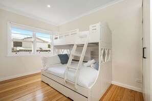 Bedroom 2 - with bunk bed (double on bottom, single on top). This room also has ample storage and games/books for the kids!