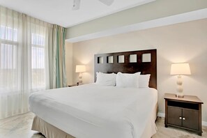 Primary bedroom with king bed and ensuite bathroom