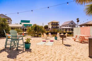Indulge in your private sand bar and outdoor grill!