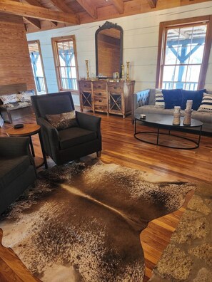 Upper level living area with fireplace vibes.
