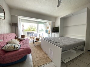 Modular sleeping area with deck bed and sofa bed