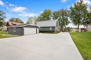 Parking available with a finished garage. Garage stores kayaks and paddle board