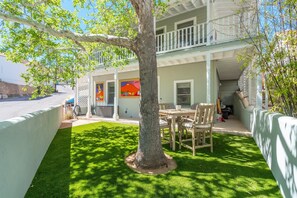 Lush, shaded, private yard to relax & unwind.