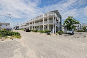 Rear of building with deckside view of the beach.