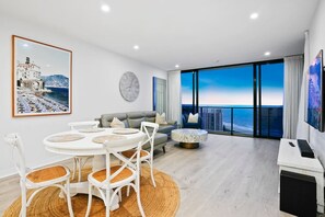 Open plan living and dining with ocean views