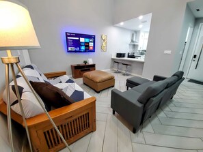 Spacious living room with futton