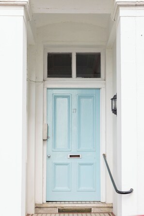 Blue front door entrance. 