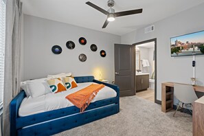 This vibrant blue room is a music lover’s dream, featuring a curated vinyl collection that sets the perfect soundtrack. Surrounded by rich hues and stylish décor, it’s a cozy retreat where you can unwind and soak in the soulful ambiance.