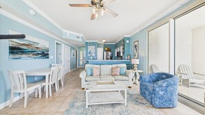 Open concept living area with comfortable furnishings TV and sofa bed