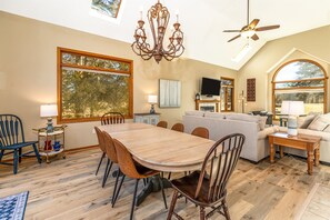 Large Dining area -- table can accommodate 8 comfortably with additional seating at the breakfast bar and additional chairs for the dining table.