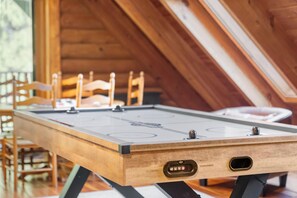 Get competitive with our new, interactive air hockey table. Fun for all ages!