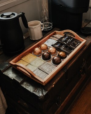 Wake up to a cozy morning in the Austen Room with a Nespresso coffee and a selection of teas. Thoughtfully curated amenities ensure a warm and inviting stay.