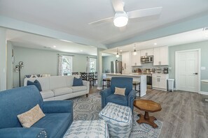 Cozy living room with comfy seating & Roku smart TV