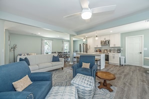 Cozy living room with comfy seating & Roku smart TV