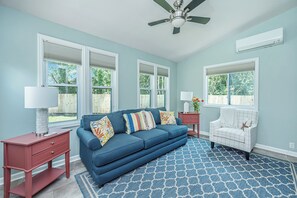 Bright, climate-controlled, sun-room with sleeper sofa 