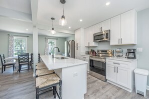 Modern kitchen with all appliances and gorgeous marble island