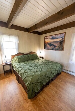 Bedroom #1 King side bed, Dresser, Tv  and large closet.
