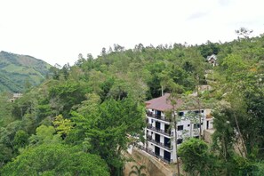 Experience luxury in our beautiful villa, nestled among lush gardens and stunning mountain views