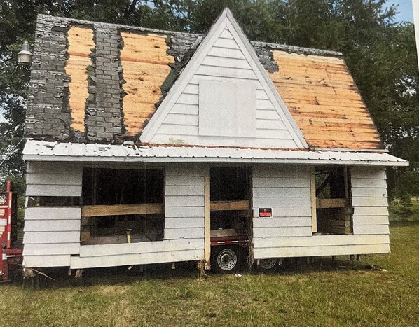 The orginial house was located where the current Dollar General store stands.