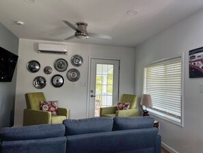 Living area connected to kitchen.  Old hubcaps from my dad's Junk Yard !