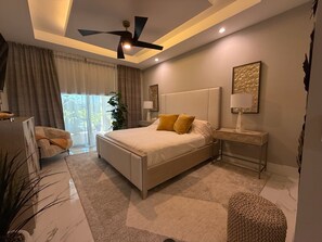 Huge master bedroom suite with en-suite bath and walk-in closet.