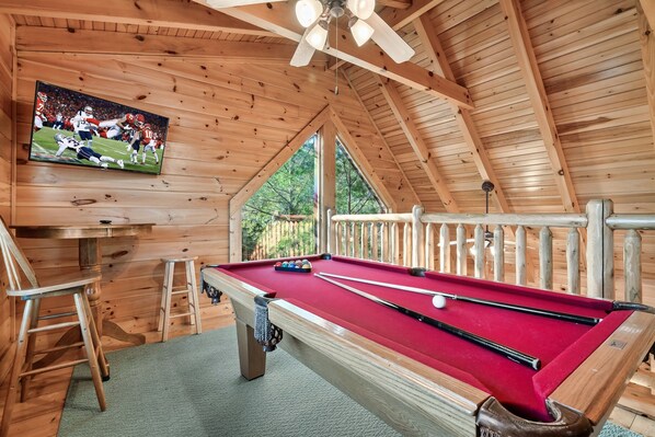 Whether you're a pro or a beginner, our billiards table is ready for you.