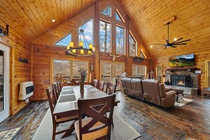 Classic Cabin with Floor to Ceiling Wood and a Wall of Windows