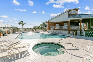 Large community pool with hot tub