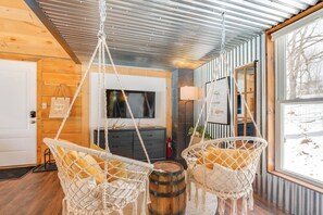 Living Room | 1st Floor | 2-Story Studio Cabin | Free WiFi | Full Sleeper Sofa