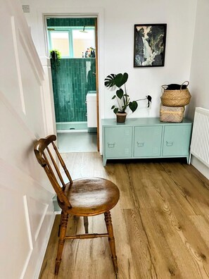 Hallway with shower room off it