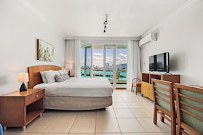 Drift off to the soothing sound of the waves and wake up to stunning beach views from your private balcony.